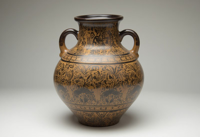 Decorative ceramic vase with intricate patterns on display