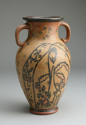 Ancient terracotta vase with floral designs from the past