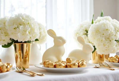 Elegant spring table setting with bunnies and flowers