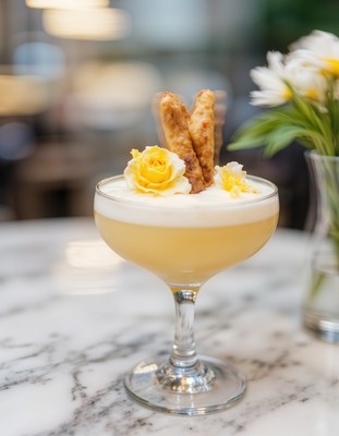 Delicious citrus cocktail with decorative toppings in cafe