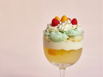 Delicious dessert with layers of cream and fruit