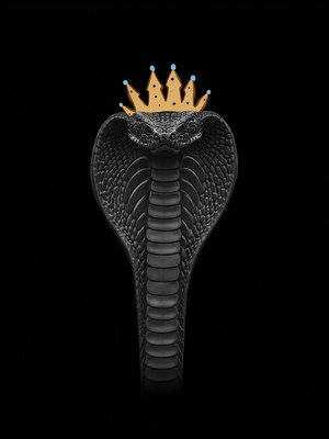 King cobra with a crown against a dark background