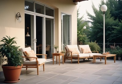 Cozy outdoor seating area on a serene patio at sunset