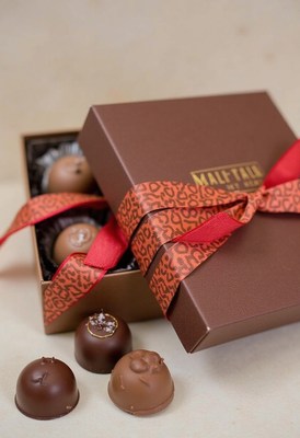 Beautifully wrapped chocolate gift box with assorted candies