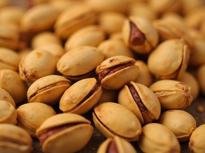 Pistachios arranged in a close-up view before roasting