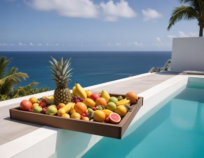 Tropical fruit platter by the pool with ocean view