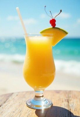 Refreshing tropical drink by the beach on a sunny day