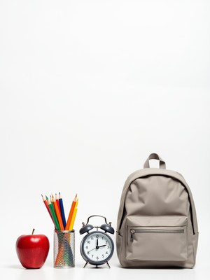 School supplies arranged on a white background for students
