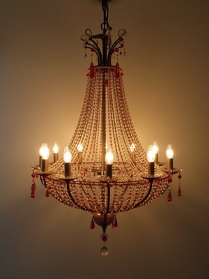 Elegant chandelier with glowing lights in a warm setting