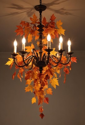 Chandelier adorned with autumn leaves for a cozy ambiance