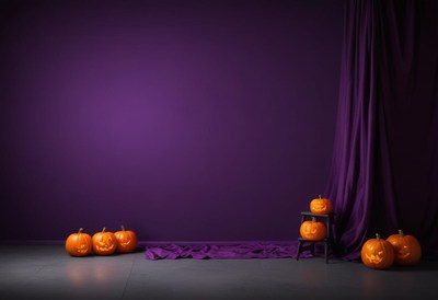 Halloween scene with carved pumpkins and purple backdrop