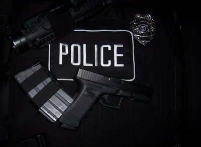 Police equipment displayed on tactical vest