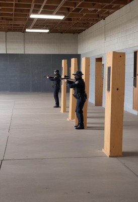 Officers practice shooting in training facility