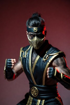 Warrior striking martial arts pose in dramatic light