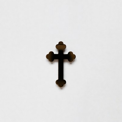 Black cross symbol on a plain background