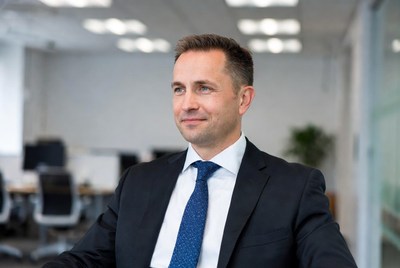 Professional man sitting in modern office setting