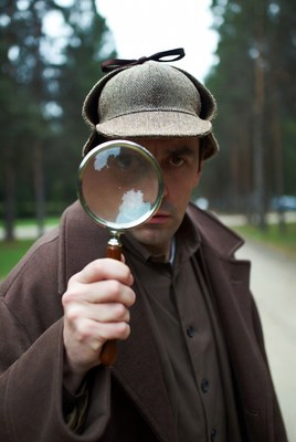 Detective examining clues in a forest setting