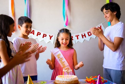 Celebrating a joyful birthday party with friends and cake