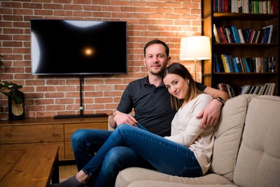 Couple enjoying cozy time in modern living room setting