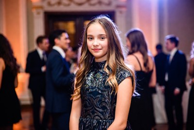 Girl in elegant dress enjoying a formal event