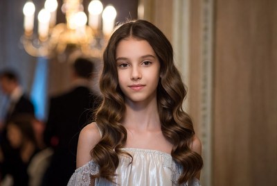 Young girl with beautiful hair at elegant event