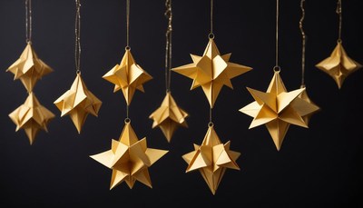 Golden star decorations hanging against a dark background