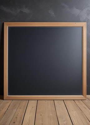 Empty chalkboard framed in wood set against dark wall