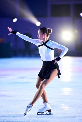 Skater performs graceful routine on ice