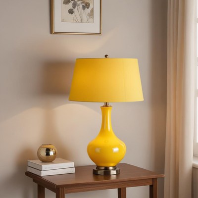 Yellow lamp on wooden table