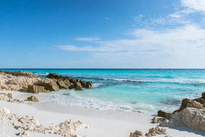 Calm beach scene in warm sunlight
