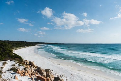 Beautiful coastal view with waves and sandy beach
