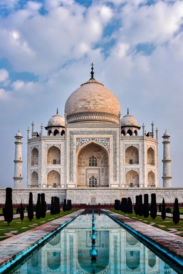 Majestic taj mahal under cloudy sky