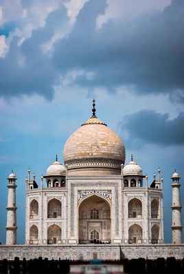 Beautiful taj mahal under cloudy skies