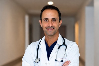 Doctor standing confidently in hospital