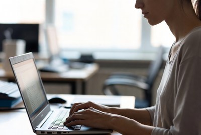 Working on a laptop at the office