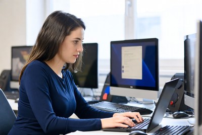 Focused student working at computer
