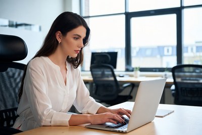 Focused woman working in modern office