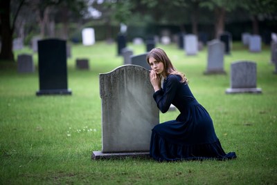Reflecting in the cemetery at dusk