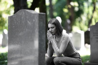 Paying respect at a gravesite
