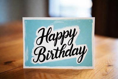 Birthday card on wooden table