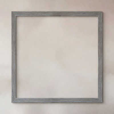 Empty silver frame on wall