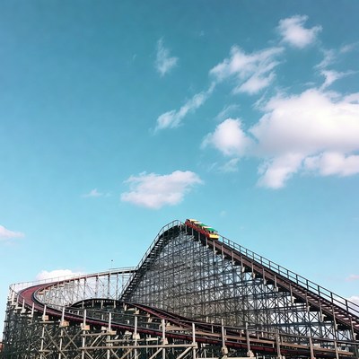 Colorful roller coaster under blue sky