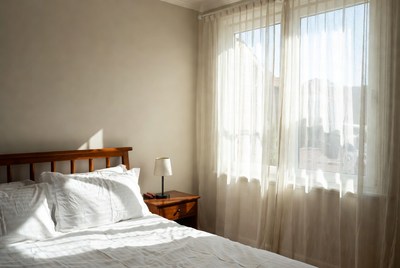 Cozy bedroom filled with sunlight