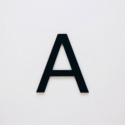 Large black letter on white background