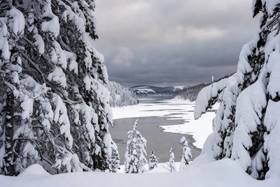 Snowy landscape by the lake