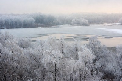 Winter landscape with frozen lake