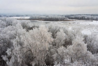 Winter landscape with frozen river