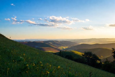 Scenic sunset over rolling hills