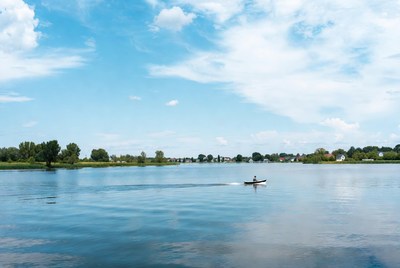 Calm waters with a small boat