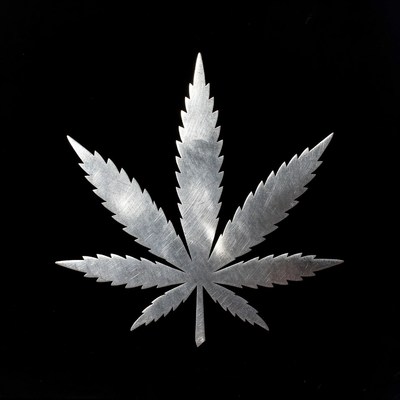 Silver cannabis leaf design on black